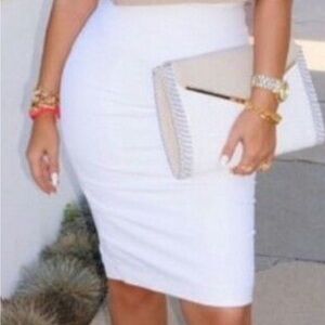 White Pencil Skirt , size 12, has a bit‎ of a stretch, flattering
